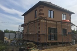 Внешняя отделка дома из СИП панелей